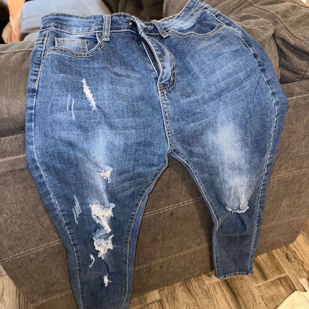 Denim jeans with small rips